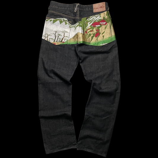 Calça jeans selvedge RMC garimpo do madruga em denim escuro com bordado japonês detalhado nos bolsos traseiros