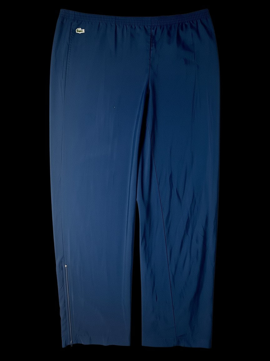 Calça vintage azul marinho da Lacoste dos anos 90, tamanho GG, com zíper na barra e logo do crocodilo