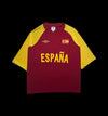 Camisa de futebol Umbro Espanha vinho com mangas amarelas, logo Umbro e bandeira da Espanha. Tamanho G.