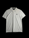 Camisa polo branca Timberland de algodão com logo bordado no peito e gola contrastante. Tamanho P.