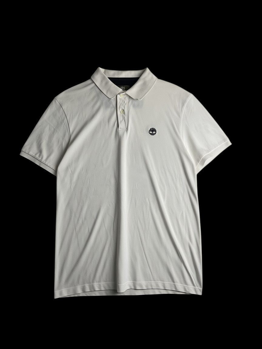 Camisa polo branca Timberland de algodão com logo bordado no peito e gola contrastante. Tamanho P.