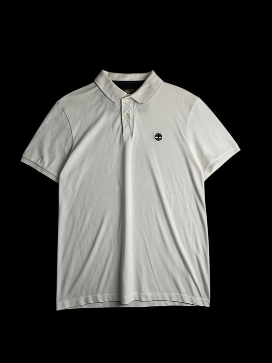Camisa polo branca Timberland de algodão com logo bordado no peito e gola contrastante. Tamanho P.