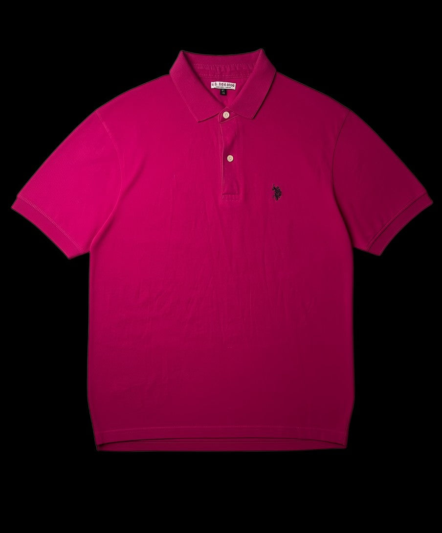 Camisa polo rosa vibrante da US Polo Assn, tamanho G, com logo bordado e botões frontais.