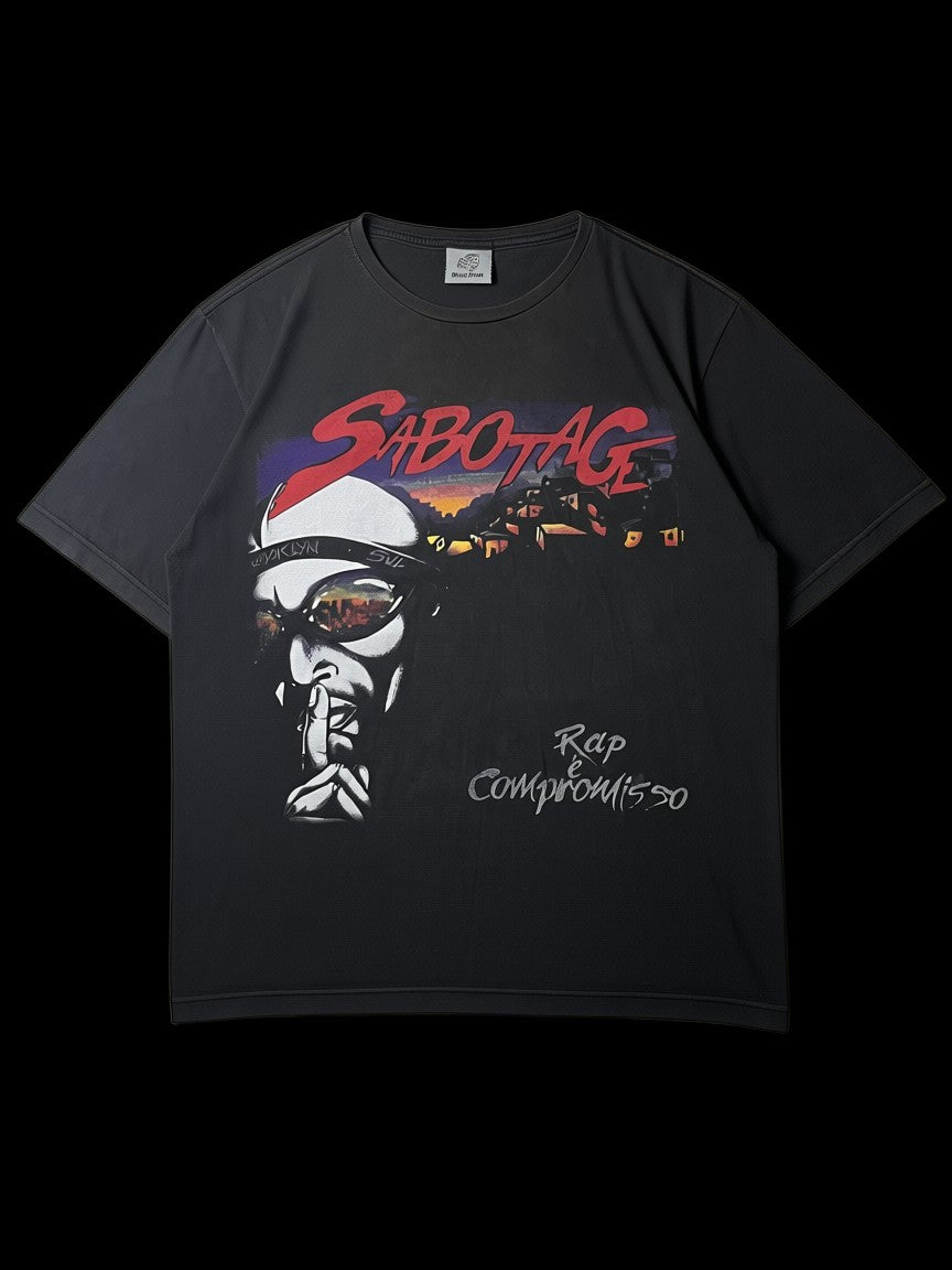 Camisa preta vintage da Sabotagem, tamanho M, com estampa gráfica de rap e pôr do sol. Peça original de época.